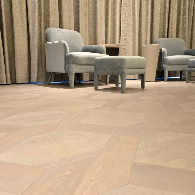 Geometric pattern semi-solid wood flooring in a lounge