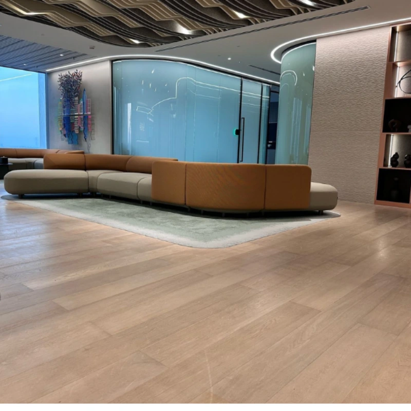 Seamless semi-solid oak flooring in office lounge