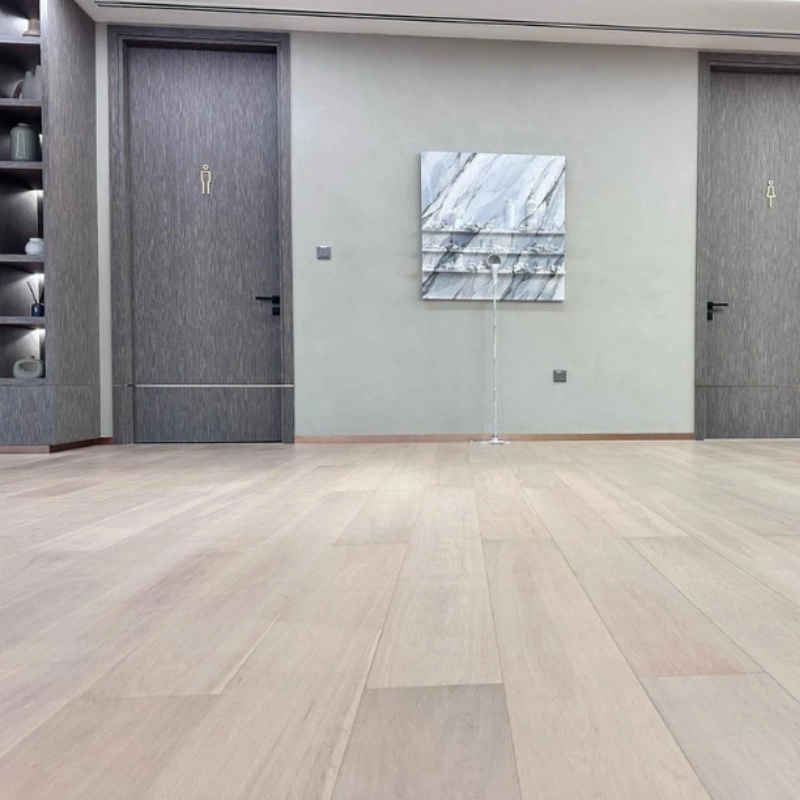 Smooth semi-solid oak planks in a minimalist hallway