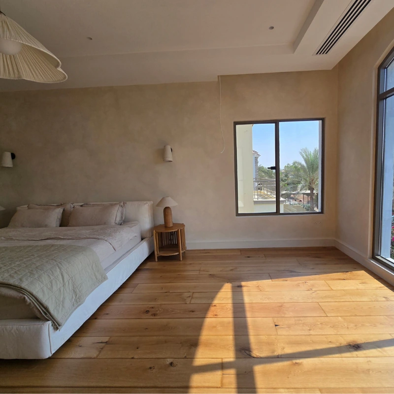 Wide plank oak semi-solid wood flooring in bedroom