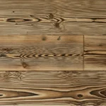 light brown semi-solid flooring featuring a high-contrast charred wood grain