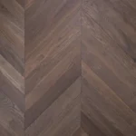 light-brown semi-solid wood flooring with a heavy, high-contrast charred grain
