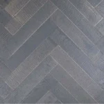 medium-brown semi-solid wood planks featuring a high-contrast charred grain